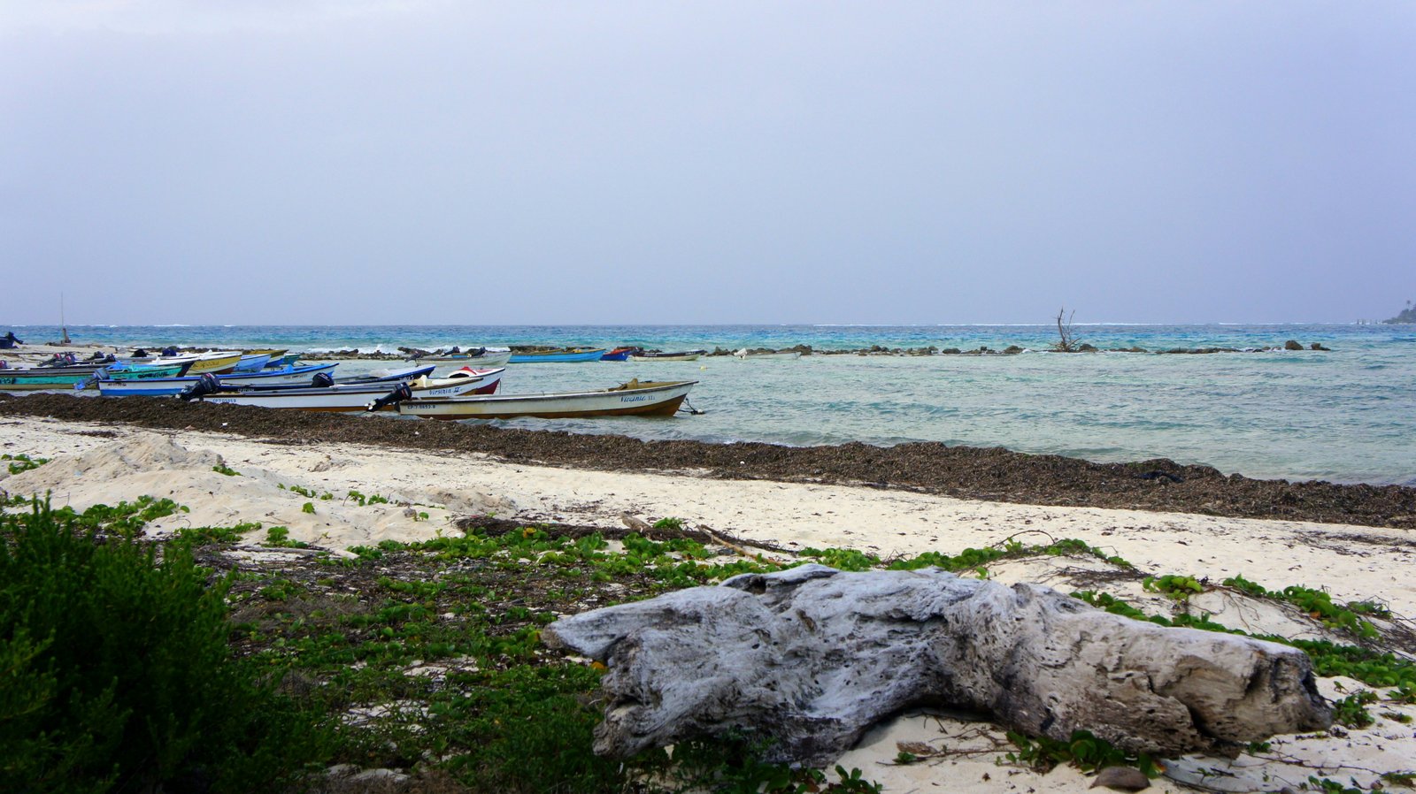 Boats in Caribbean Colombia crystal blue water island near Cartagena